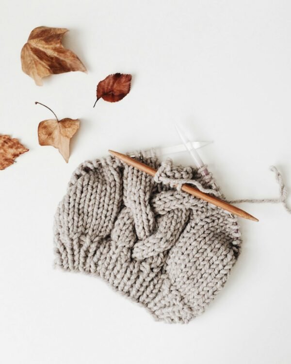 Knit beanie on neutral background