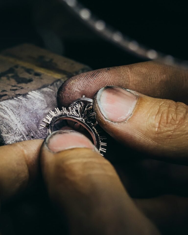 Silver ring on hand, soft neutral light